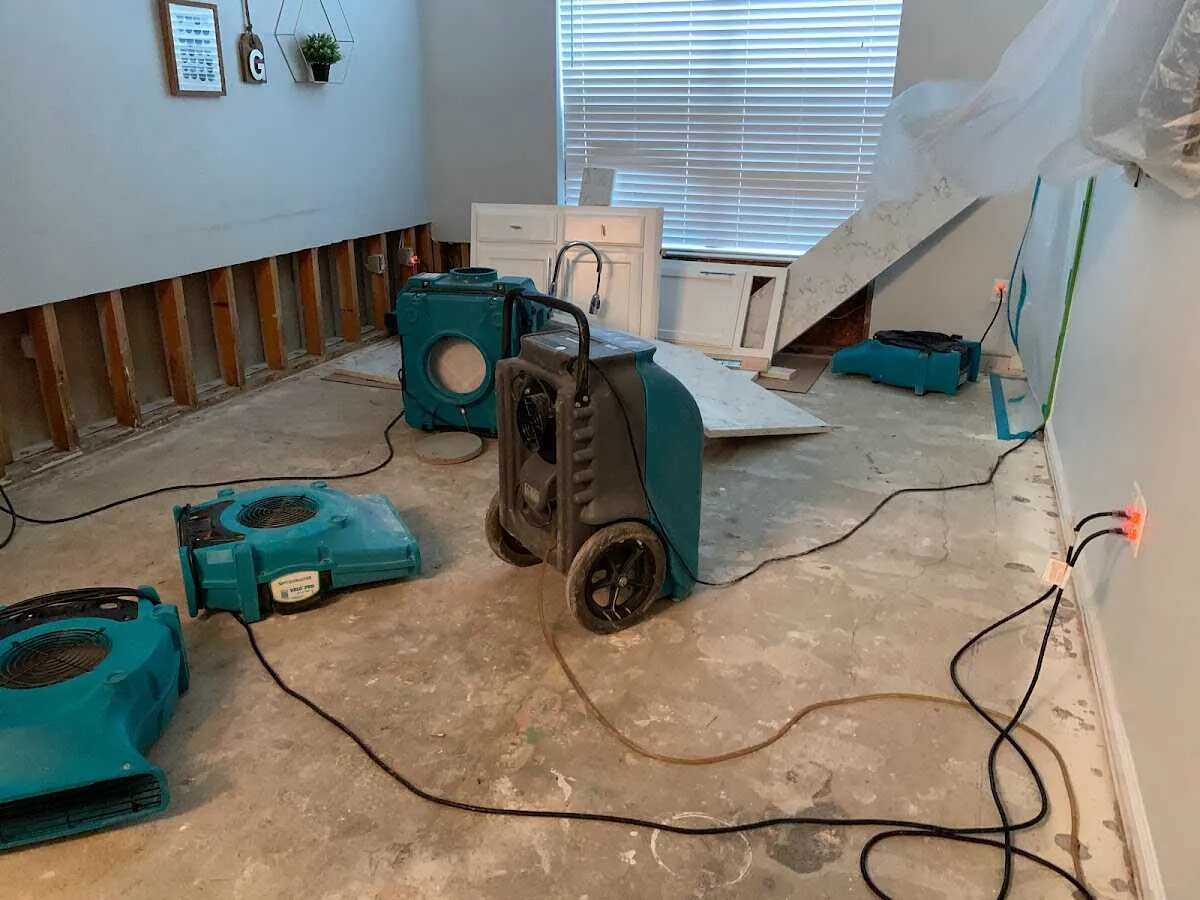 Dehumidifier in flood-cut room for Water Damage Restoration in Kirksville